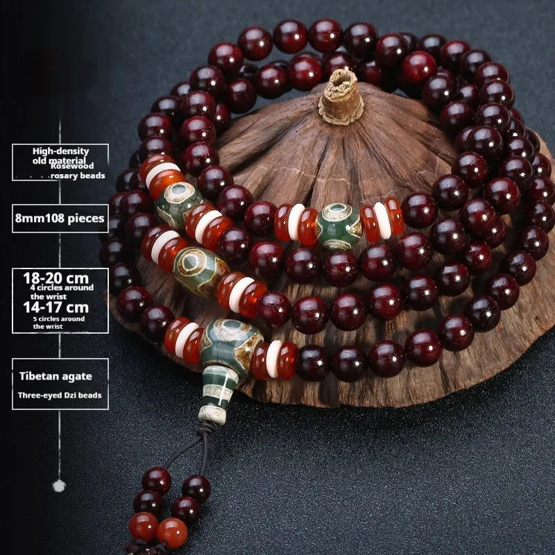 Men's traditional rosewood bracelet with 108 beads, showing lapis lazuli and turquoise accent styles.