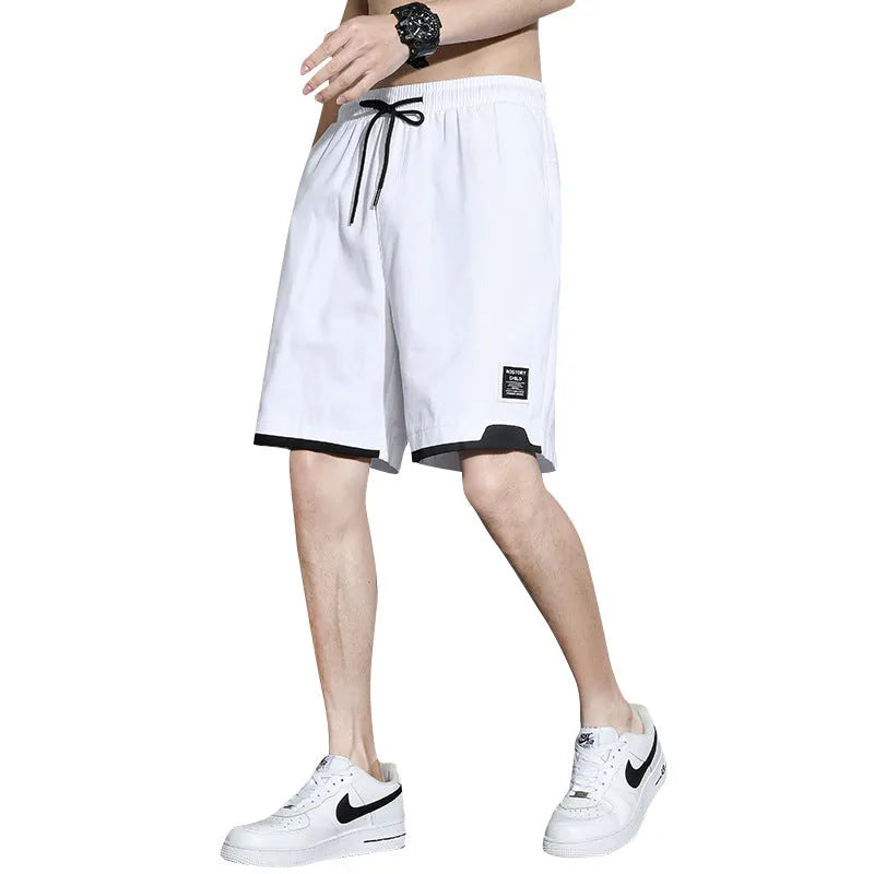 Boys cotton shorts in black, khaki, or white, shown in a loose-fitting Japanese style for summer.