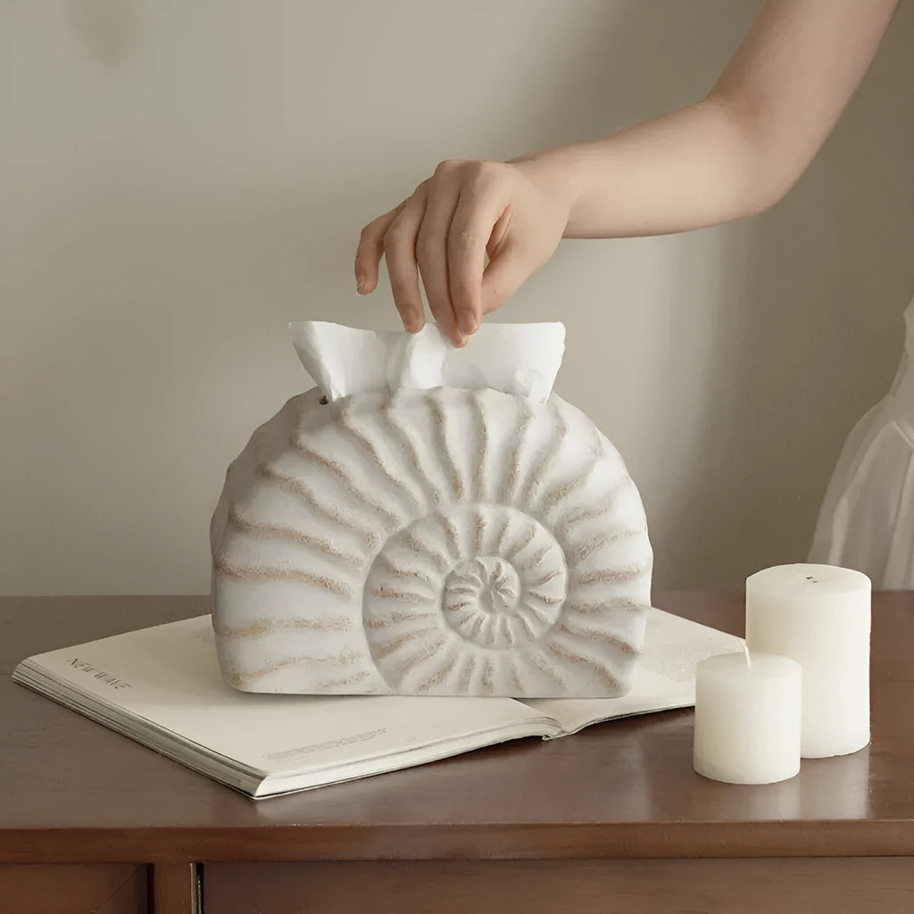 Conch ramble coloured resin decorative tissue box holder with a modern simple design.