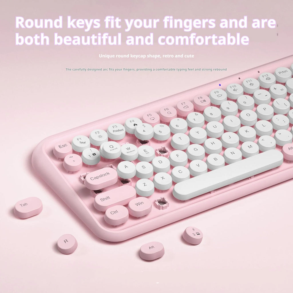 Pink portable Bluetooth keyboard with 84 keys and wireless connectivity