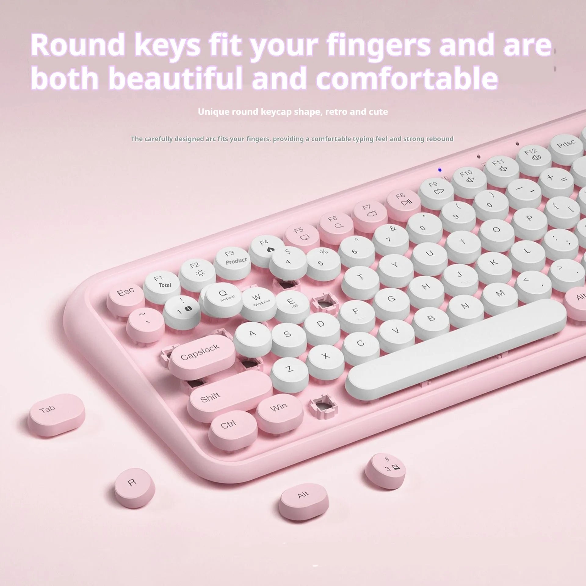 Pink portable Bluetooth keyboard with 84 keys and wireless connectivity