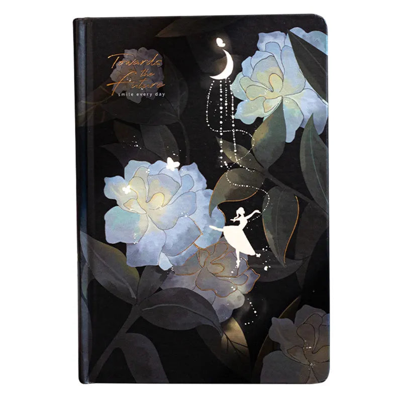 A5 scrapbook notebook with luminous cover open to show colour illustration pages, in purple colour option.