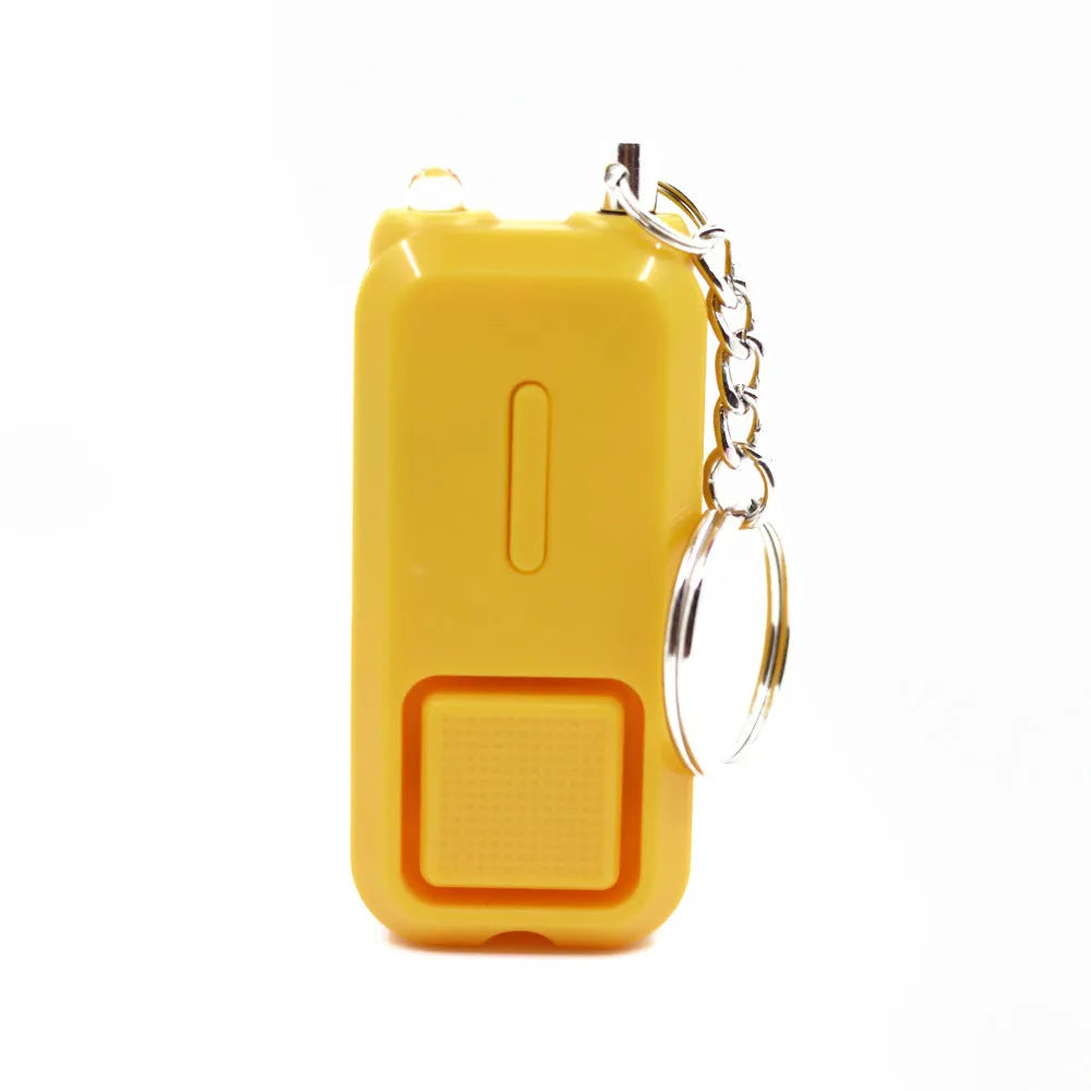 Compact personal safety alarm device in multiple colours showing 65x30x12mm dimensions