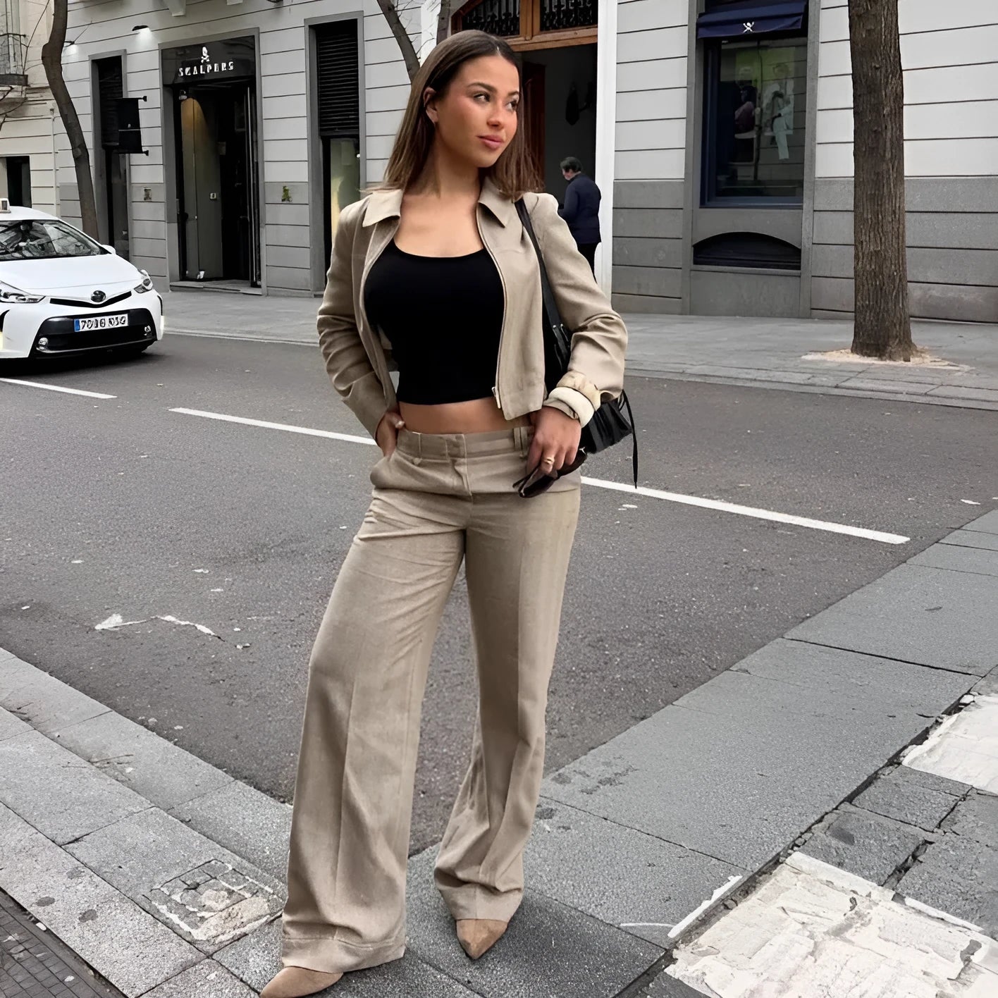 Women's herringbone pattern suit set with 3D embroidery, featuring a long sleeve jacket and straight-leg trousers.