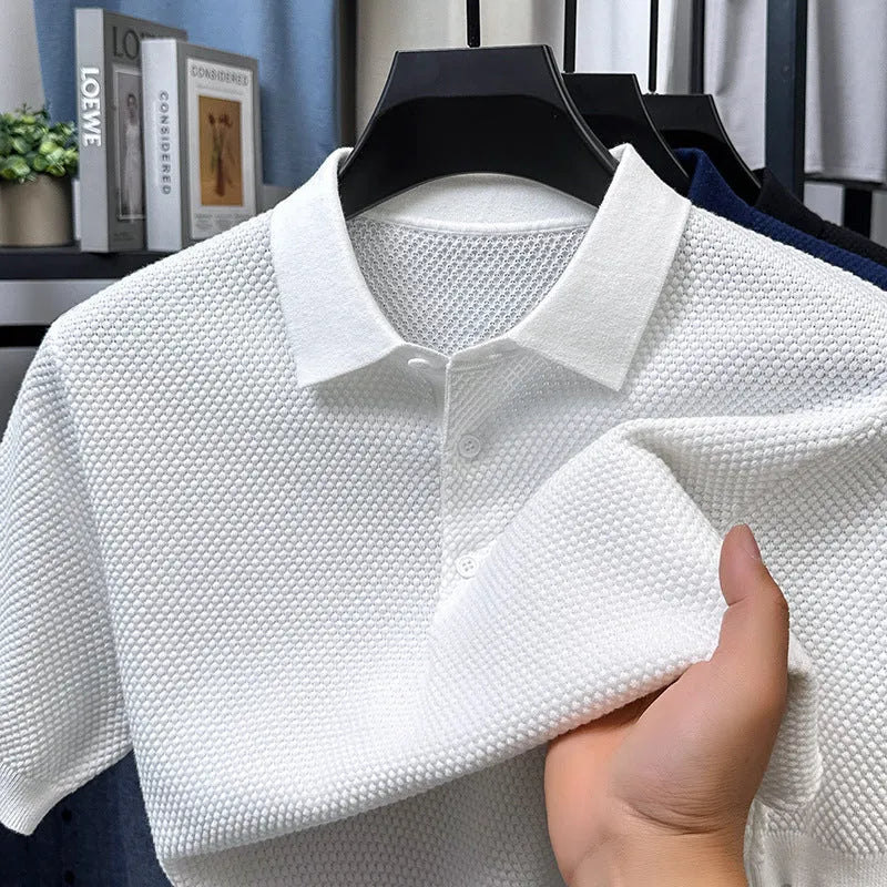 Loose fit pure cotton short sleeve pullover sweater shown in various colours including grey and navy.