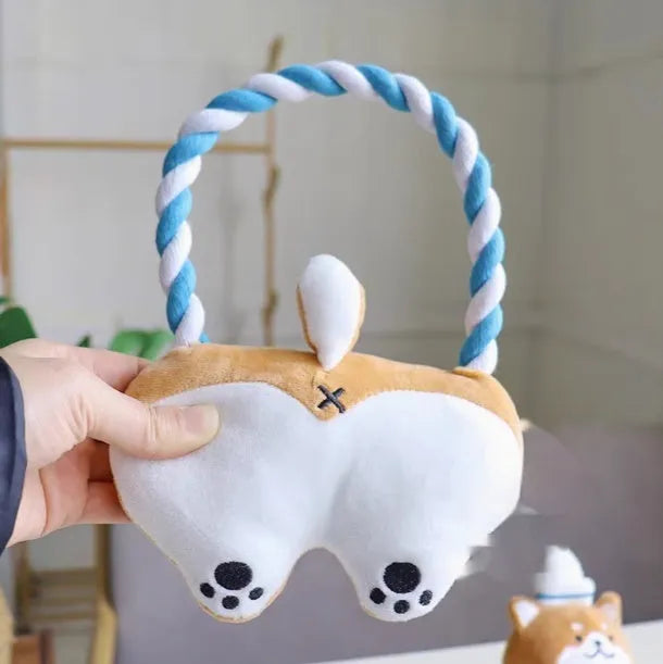 Plush dog toys in Xiaojiu butt, seal, whale, dolphin, and Shiba Inu shapes on a light background