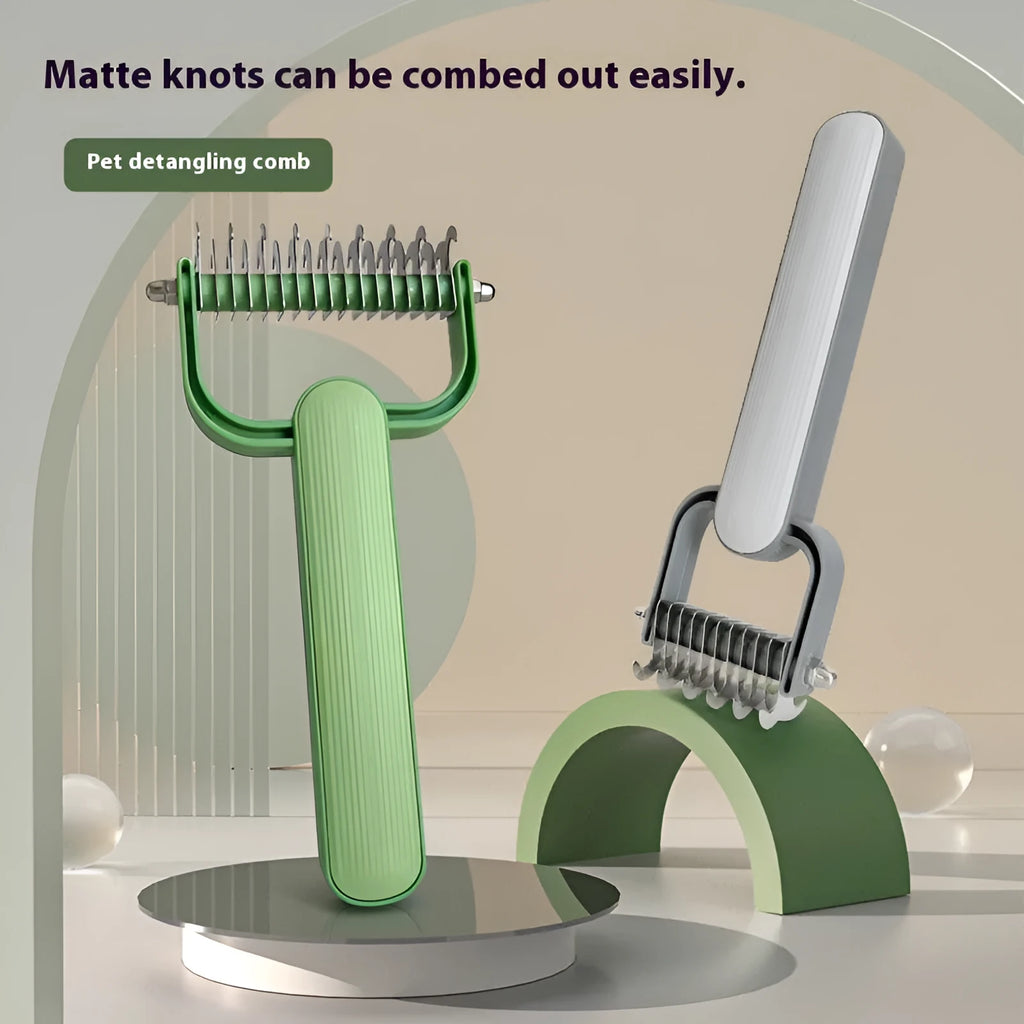 Green and grey dog grooming comb with stainless steel teeth for removing mats and tangles.