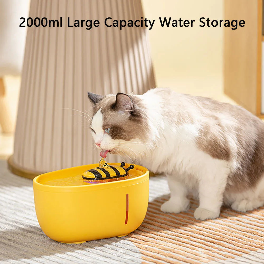 Yellow 4-litre pet water fountain with filter and blue LED light for cats and dogs