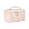 Open-top solid colour PU leather makeup bag in light blue on a white surface