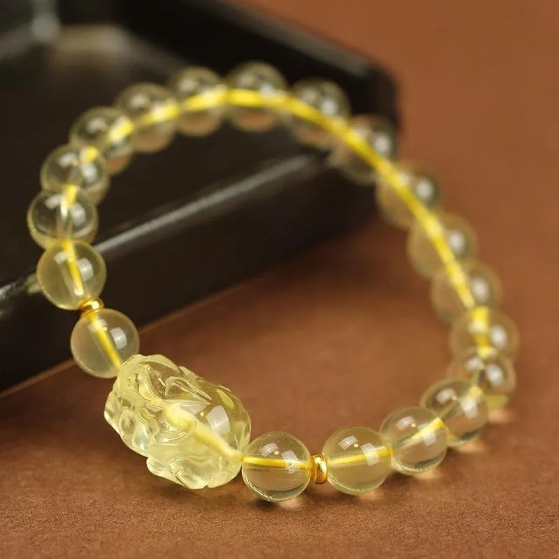 Yellow leather bracelet with artificial citrine crystal Pi Xiu charm.