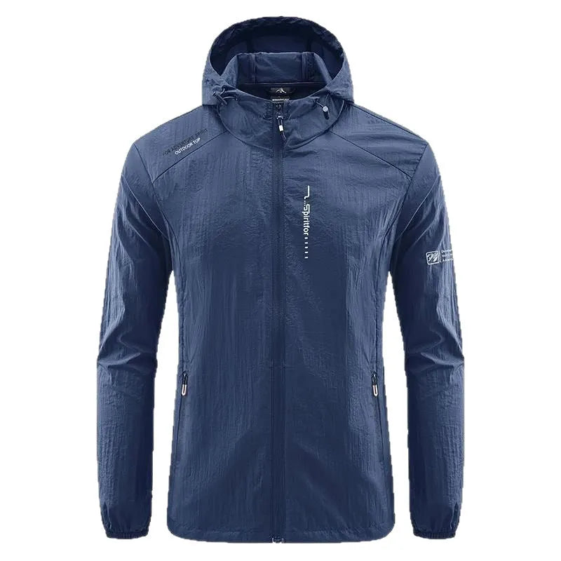 Man wearing a light grey loose-fitting hooded nylon summer jacket for sun protection.