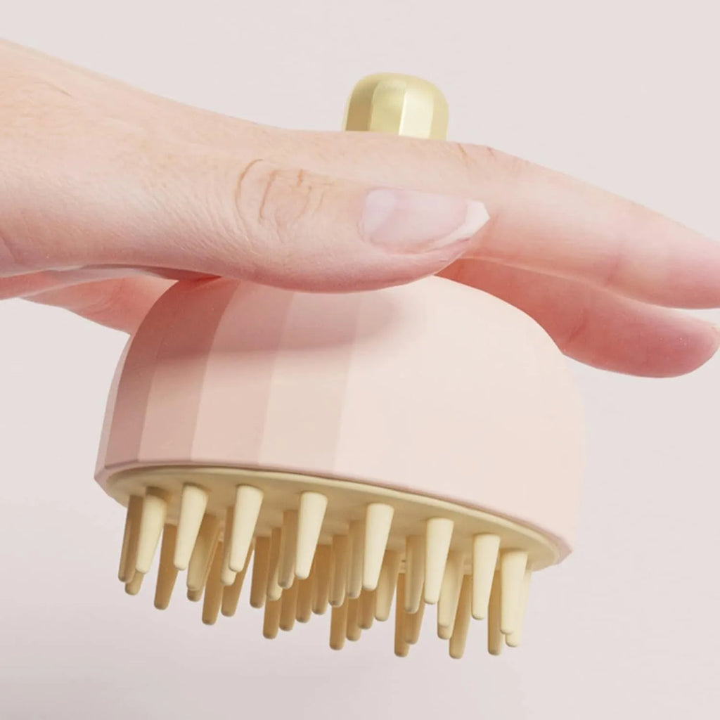 Green pet bath massage brush with dual-sided head and drain holes for dog and cat grooming