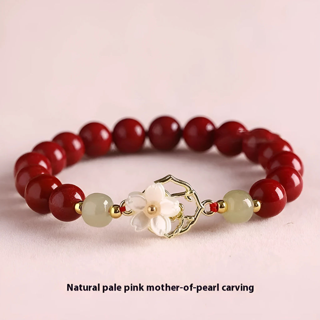 Handcrafted cinnabar women's bracelet with natural Hetian jade accents in New Chinese style design