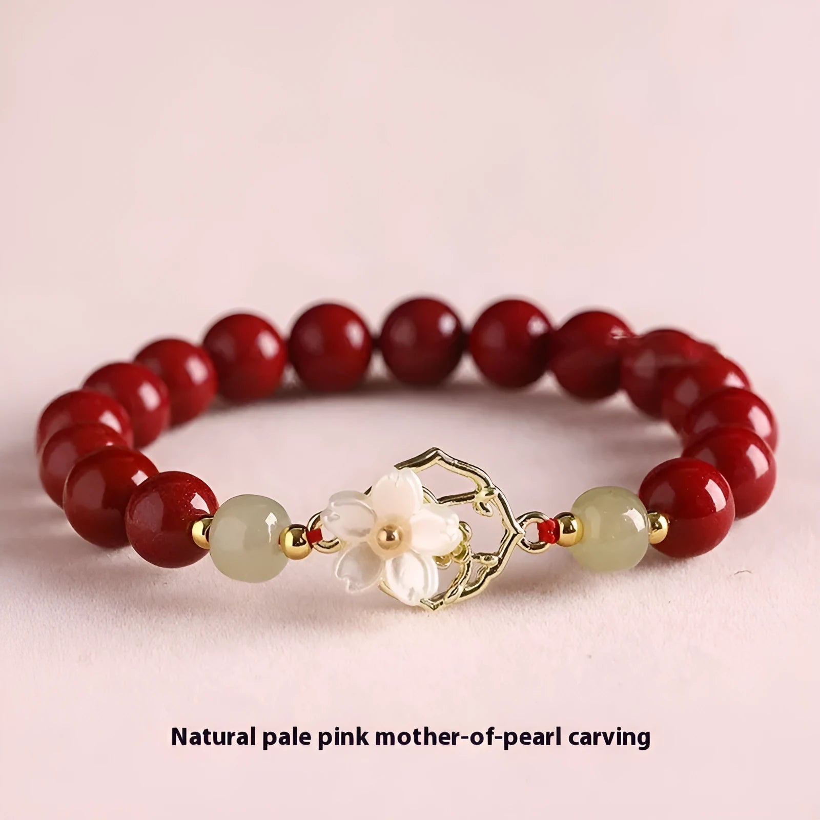 Handcrafted cinnabar women's bracelet with natural Hetian jade accents in New Chinese style design