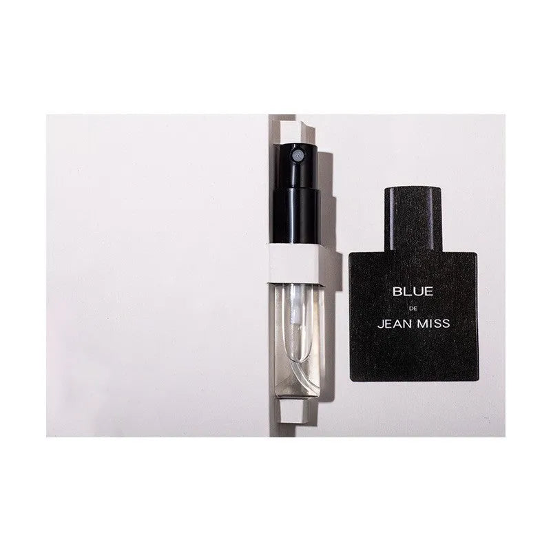 Men's perfume in black bottle with woody citrus fragrance notes of sandalwood and cedar
