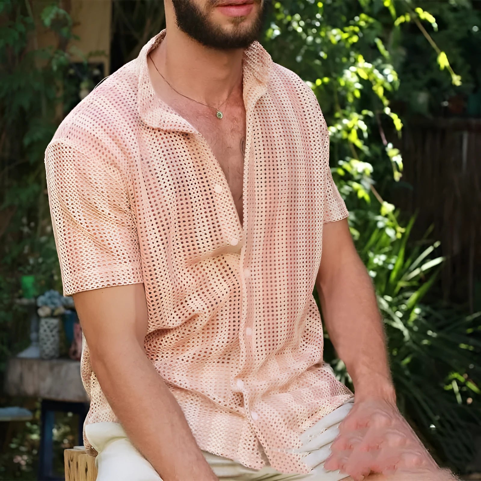 Pink men's short-sleeve cardigan shirt with waffle weave texture, loose fit