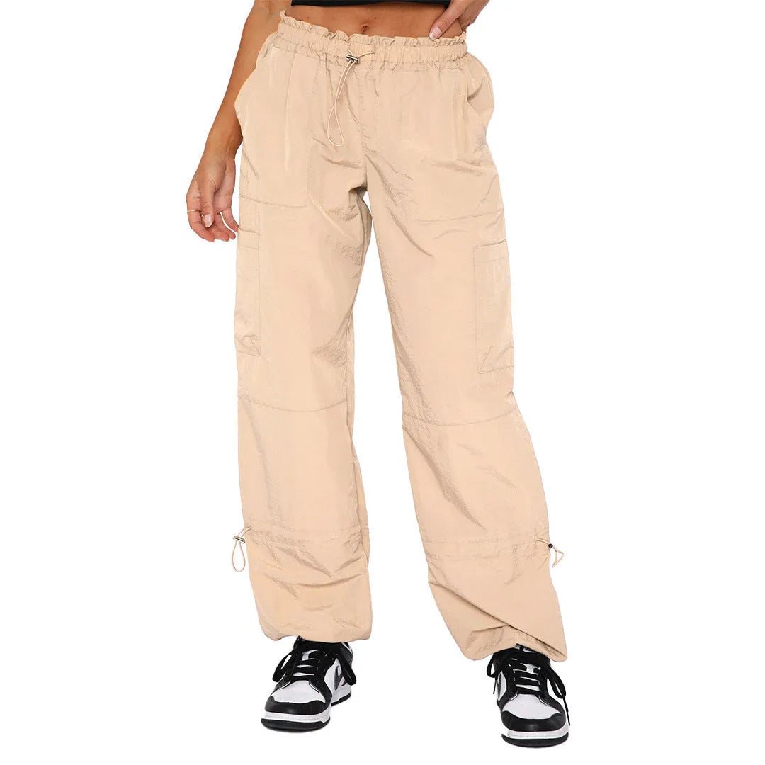 Multi-pocket cargo casual pants in a loose fit, shown in a neutral colour like grey or khaki.