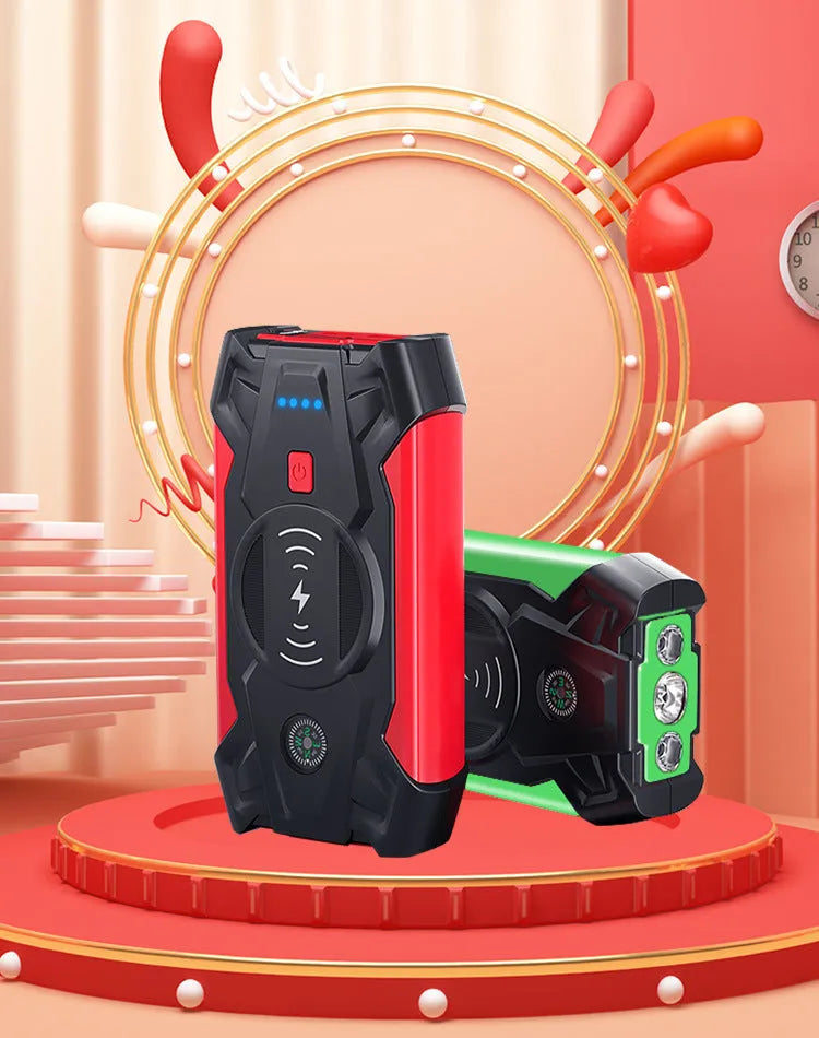 Red car emergency jump starter with digital display and battery clips showing 39800A peak current