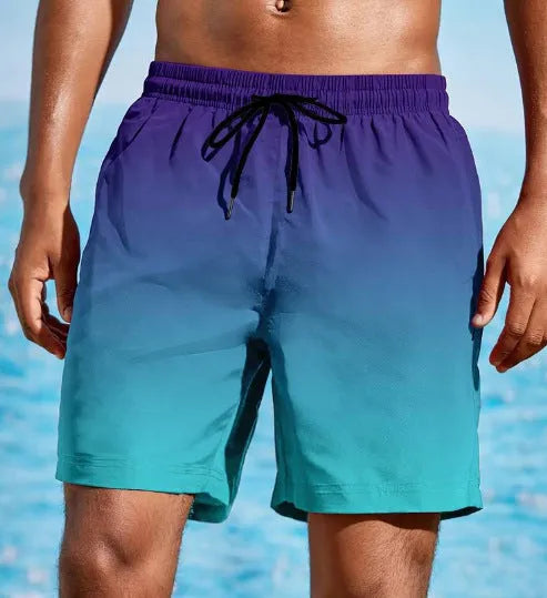 Men's grey gradient 3D digital print mesh sports shorts on a white background.