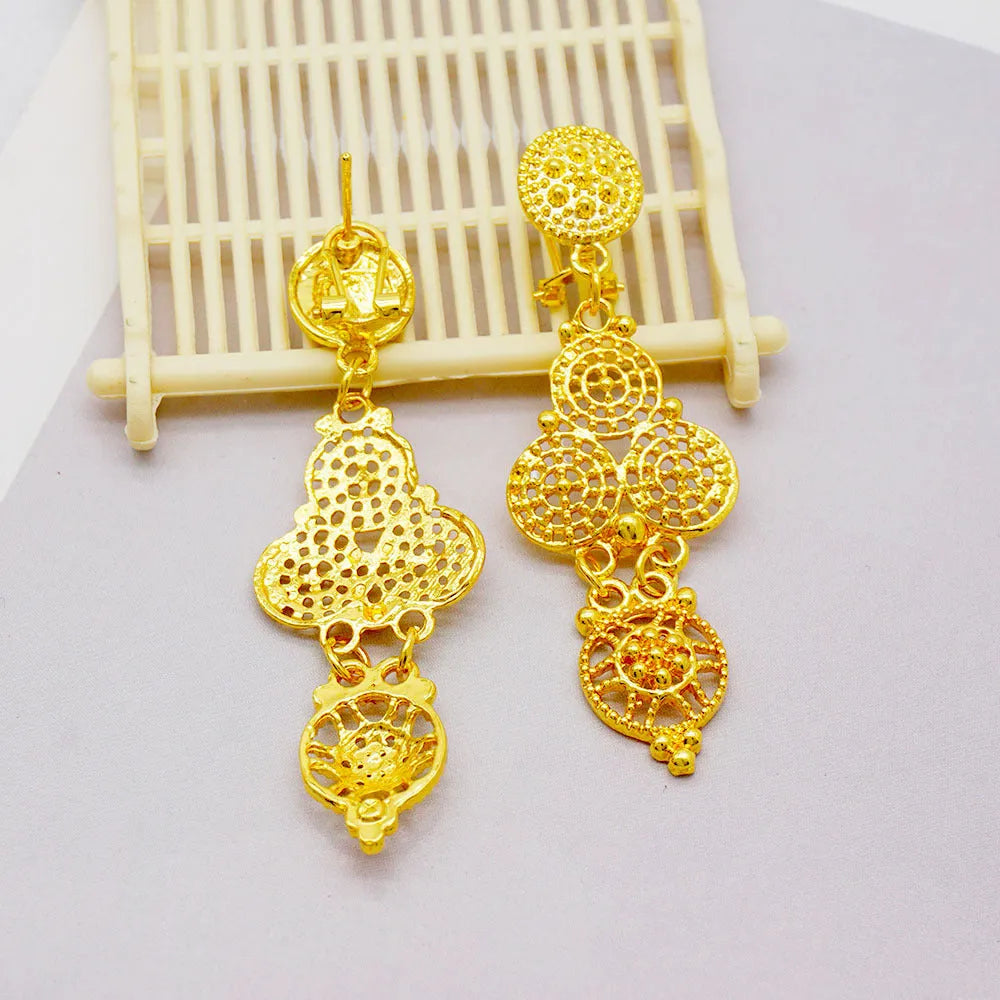 Dubai golden tassel jewellery set including necklace, earrings, bracelet, and ring with water wave chain, alloy construction