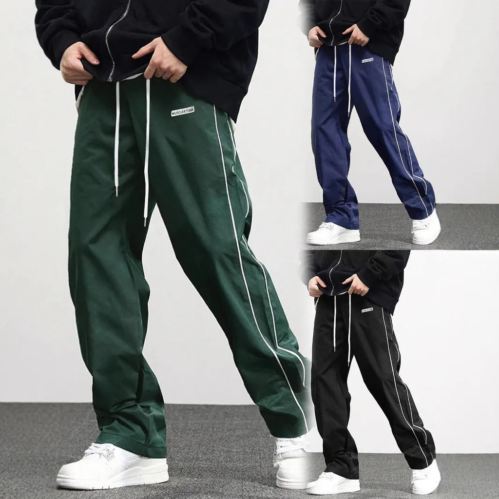 Men's loose fit polyester cargo trousers with side pockets in black, navy blue, and dark green
