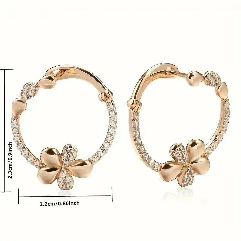 A pair of round geometric ring earrings for women with a copper base and electroplated finish.