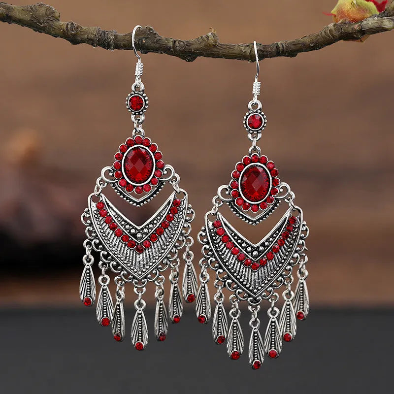 A pair of smart water drop purple retro long fringe drop earrings made from alloy metal.