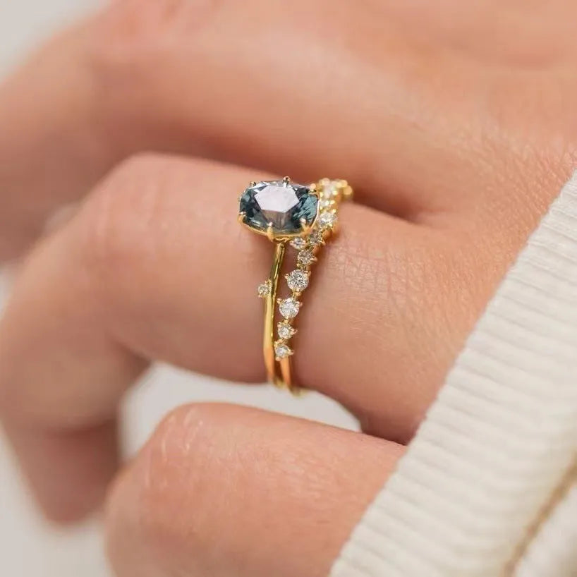 Gold plated women's flower ring with green zircon stones in sizes 6 to 10