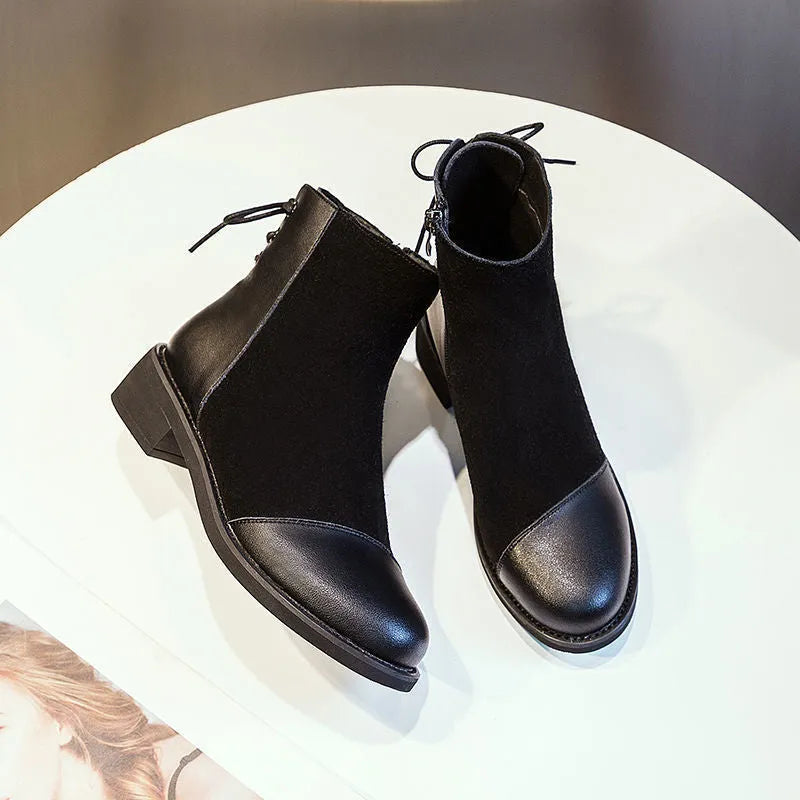 Black women's knee-high Martin boots with side zip and bow detail