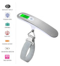 Portable silver LCD digital luggage scale with belt and backlit display showing weight in kg