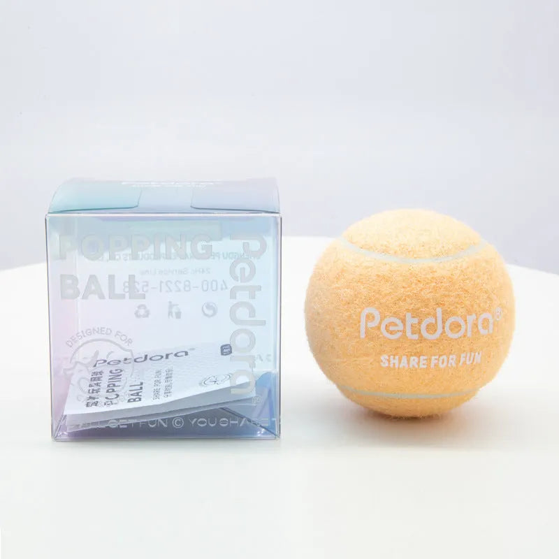Dog toy high elastic macaron pet tennis ball in ice crystal blue on white background