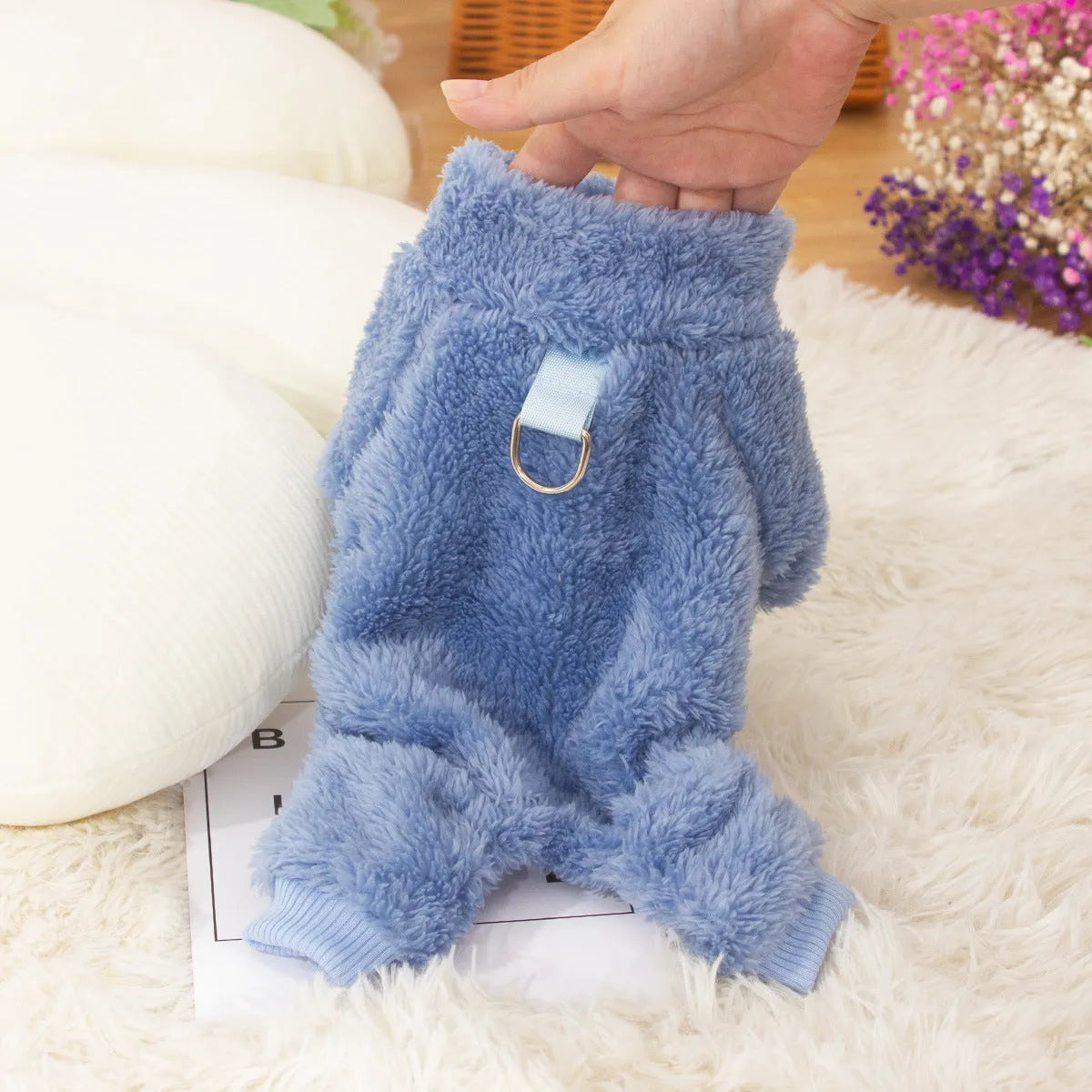 Double-sided thick plush dog coat with high collar in blue colour showing four-legged design and towing ring