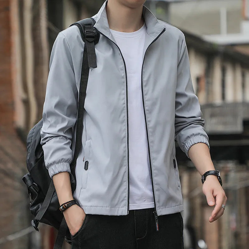 Men's loose fit Korean style lapel jacket in black casual autumn outerwear with zipper pocket