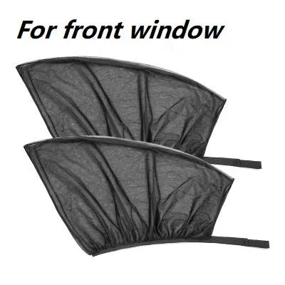 Set of grey non-woven fabric car side window sunshades with elastic edges on a car window.