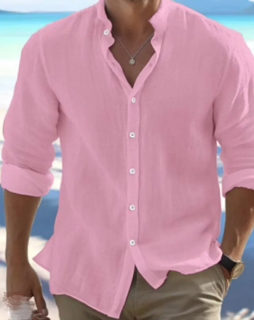 Men's white linen button-up summer beach shirt with collar on a hanger.
