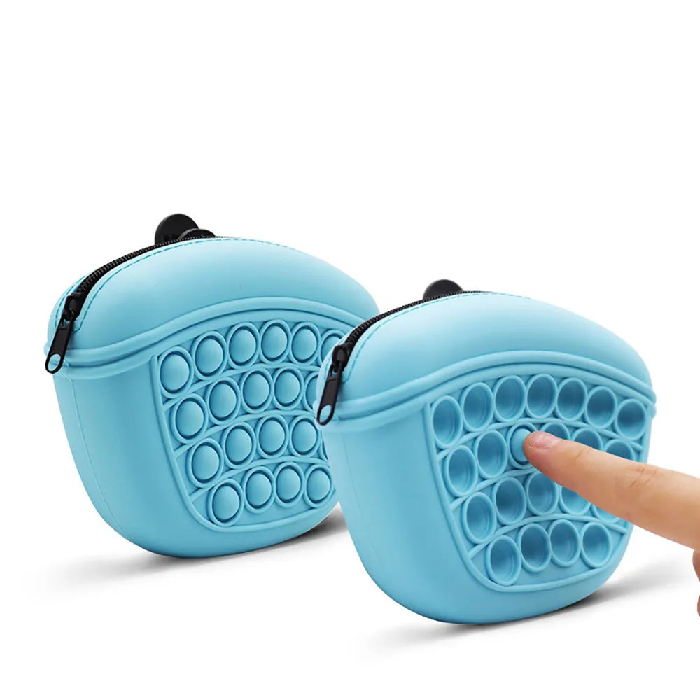 Blue silicone dog training treat pouch with magnetic closure and waist clip on a belt