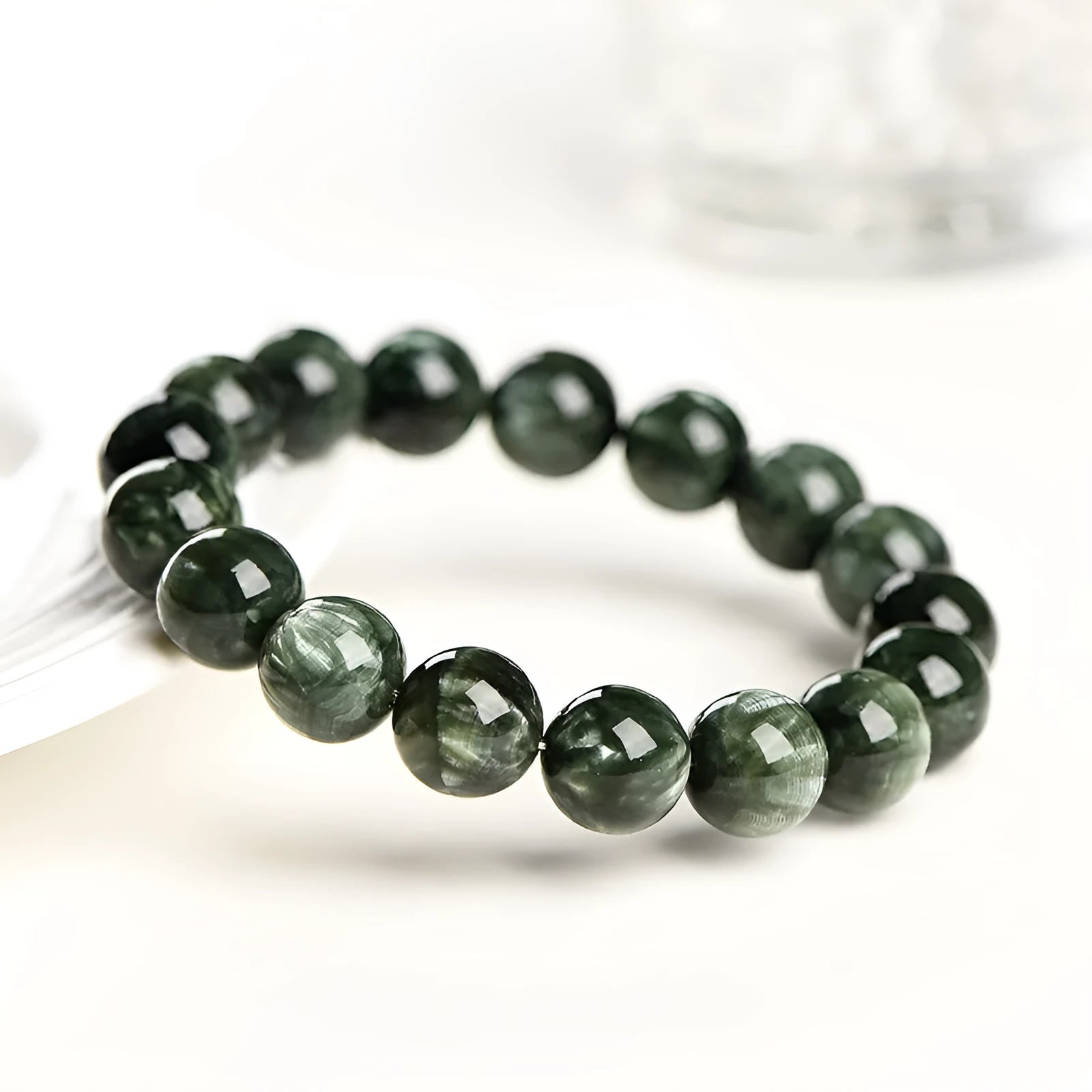 Natural green dragon crystal bead bracelet with geometric 8-9mm beads and Ruyi decoration.