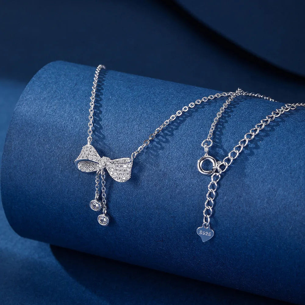 S925 sterling silver bow necklace on adjustable O-ring chain