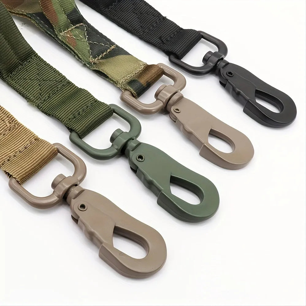 A black retractable dog leash for large breeds, extended to show its length, with a comfortable handle and reflective stitching.