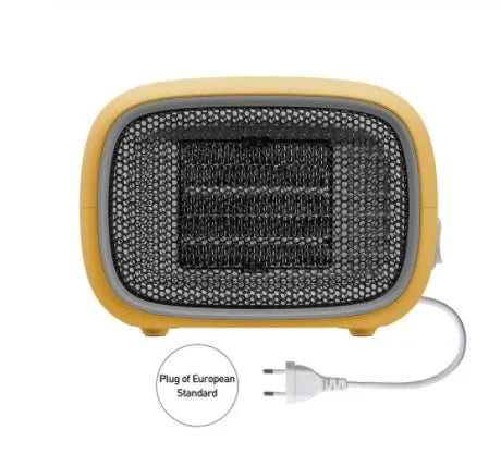 Green mini PTC ceramic fan heater showing compact size and metal mesh front grille.