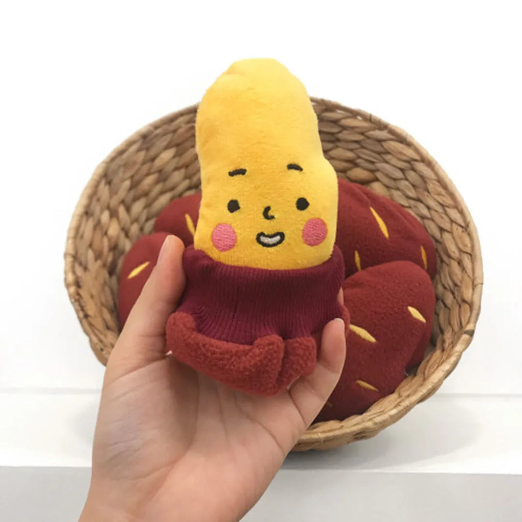 Red sweet potato shaped pet hidden food toy with treat pocket for slow feeding