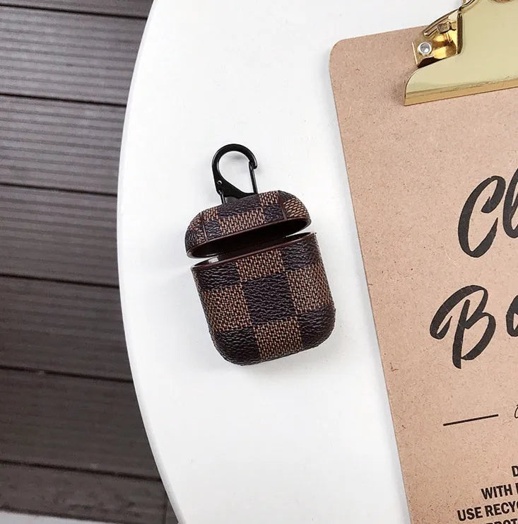 Black lattice plastic hard shell case for iPhone XS Max with an anti-lost hook attachment.