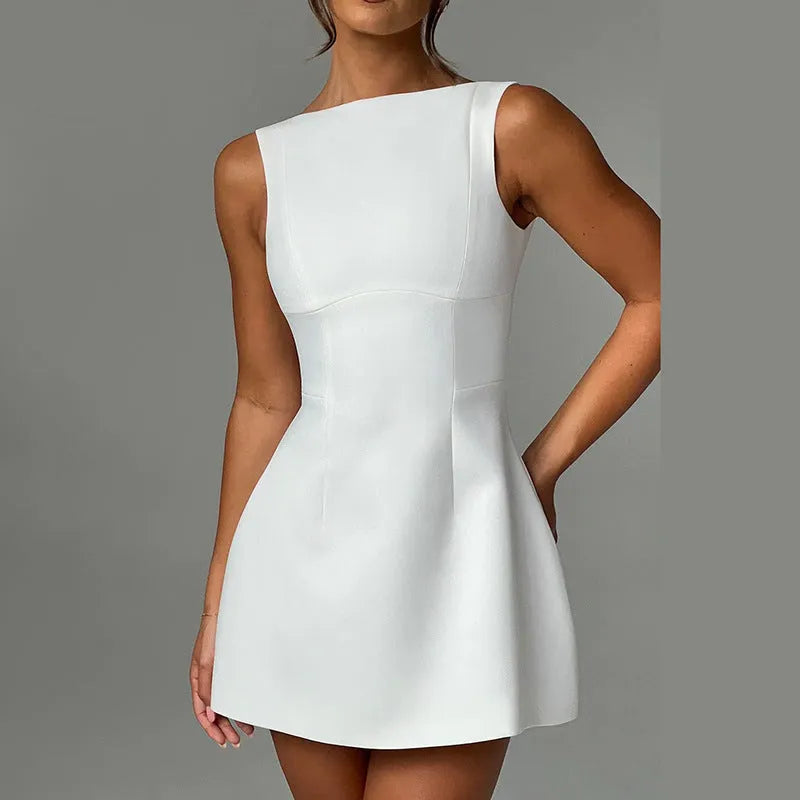 Women's slim-fit backless summer dress with sling straps in a selection of colours.