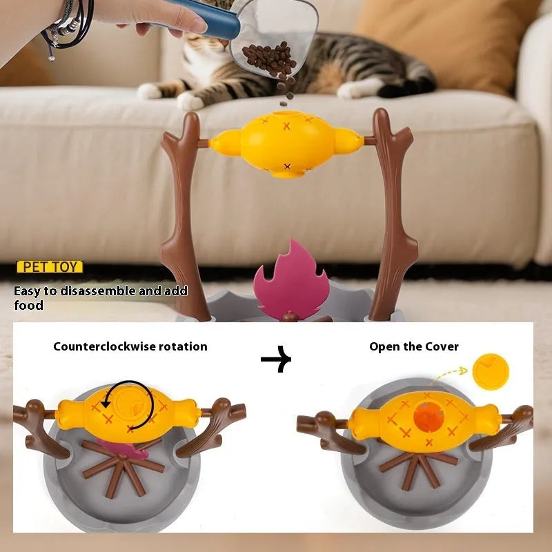 Tumbling barbecue-style cat feeder toy with leakage food dispenser, shown in plastic construction.