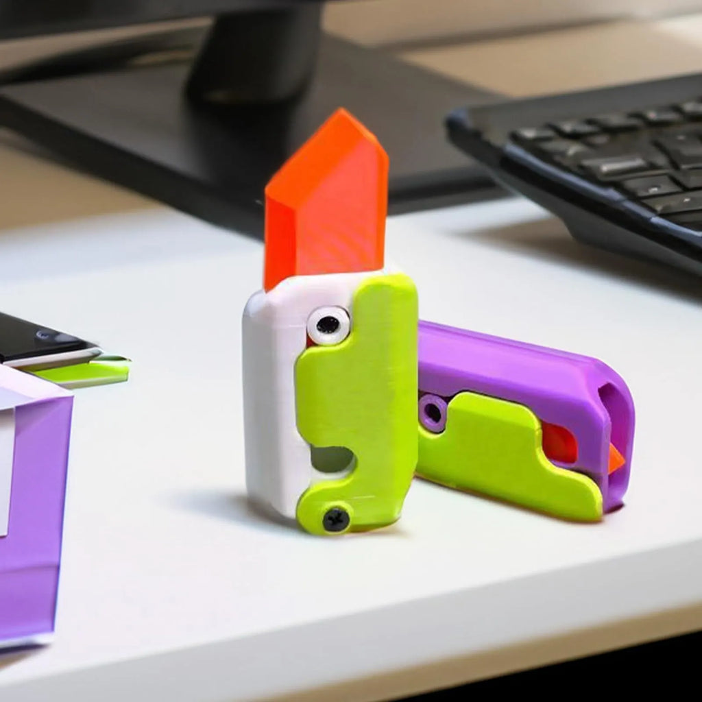 Carrot-shaped 3D printed plastic gravity fidget knife with orange purple green colour scheme