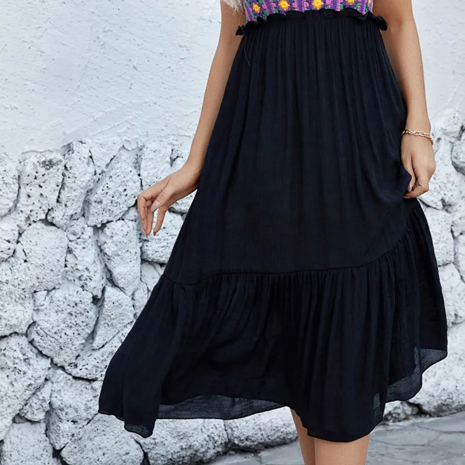Purple hand-hooked crochet sleeveless dress with floral stitching pattern, knee-length A-line silhouette.