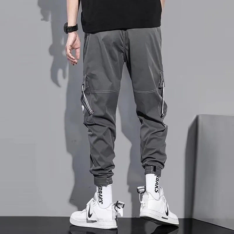 Men's loose fit polyester solid colour trousers in black or gray, autumn casual style, size S to 5XL