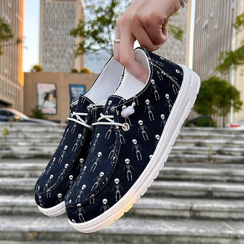 Women's black canvas low top casual shoes with soft sole, cloth lining, available in sizes 37 to 42