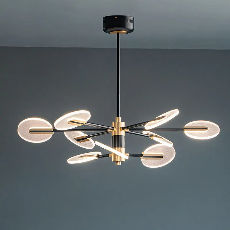 White iron frame LED chandelier with multiple acrylic shades hanging from ceiling