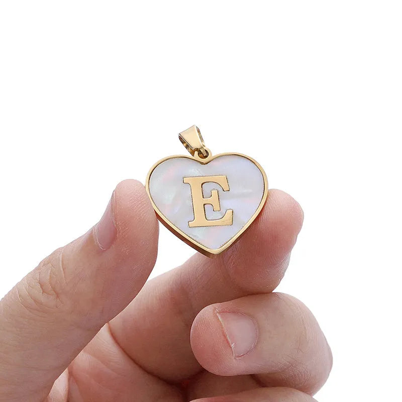 Gold-plated heart necklace with white shell design on adjustable stainless steel chain